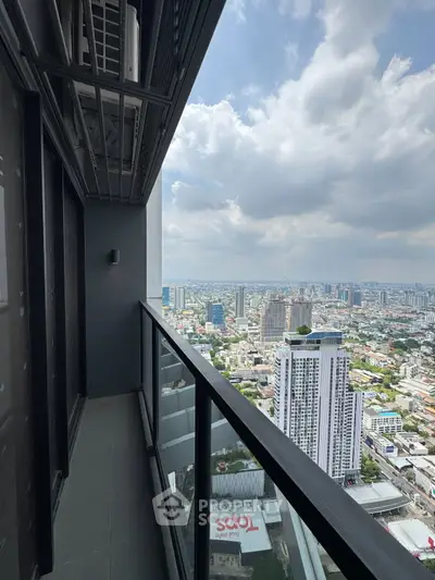 Stunning high-rise balcony with panoramic city views, perfect for urban living enthusiasts.