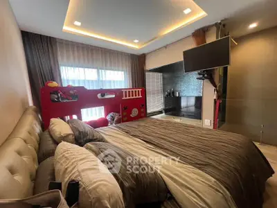 Luxurious bedroom with modern decor and unique children's bed