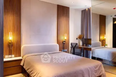 Modern bedroom with stylish wood paneling and cozy lighting