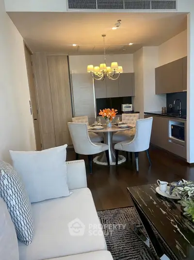 Elegant modern living room with dining area and stylish furniture