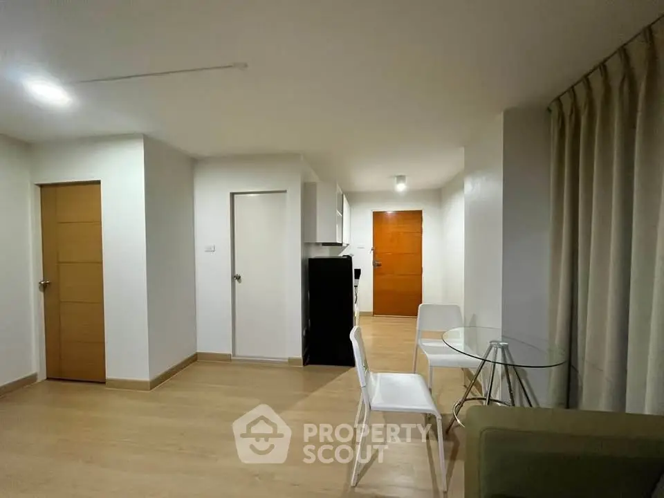Modern apartment interior with open layout and minimalist furniture