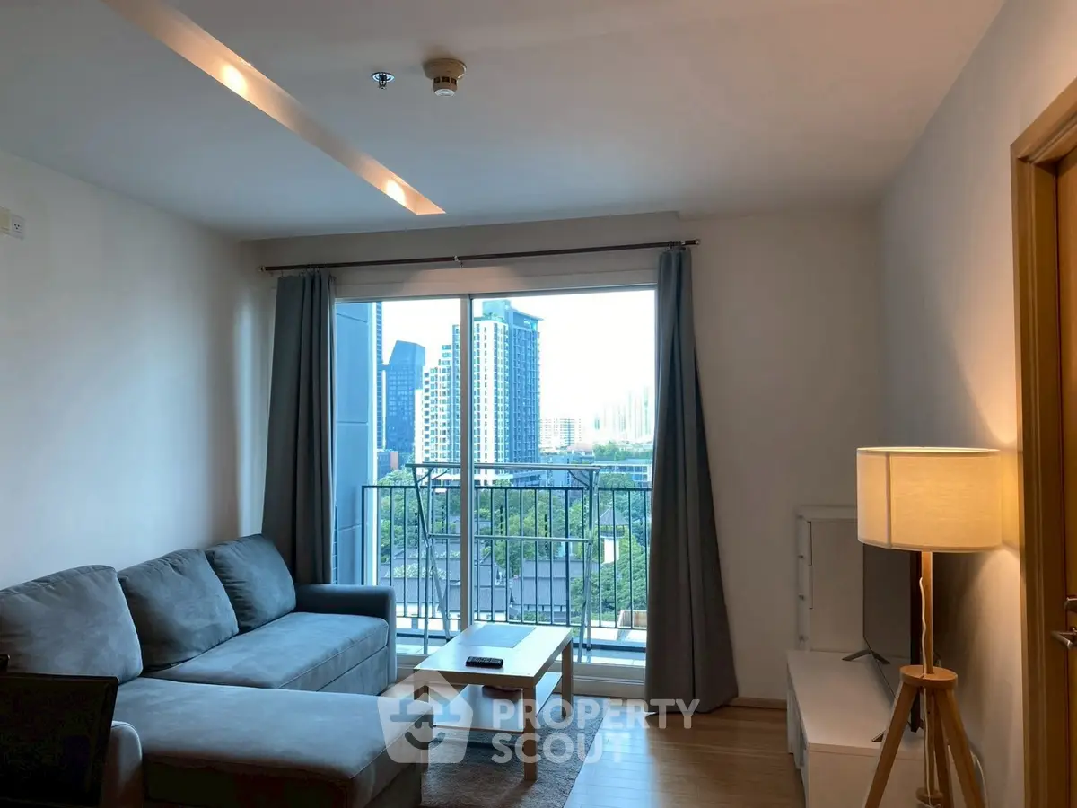 Modern living room with city view and cozy furniture