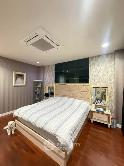 Elegant bedroom with stylish decor and cozy ambiance