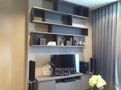 Modern living room with stylish shelving and entertainment center