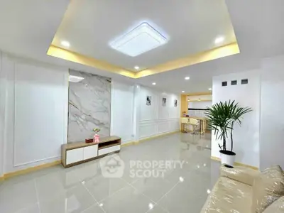 Spacious modern living room with elegant decor and open layout