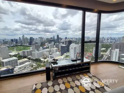 Stunning high-rise apartment with panoramic city views and modern interior design.