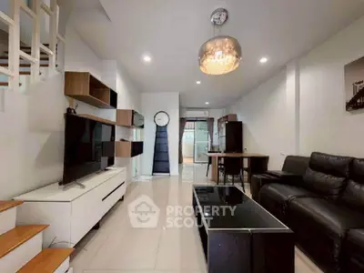 Modern living room with sleek furniture and stylish lighting