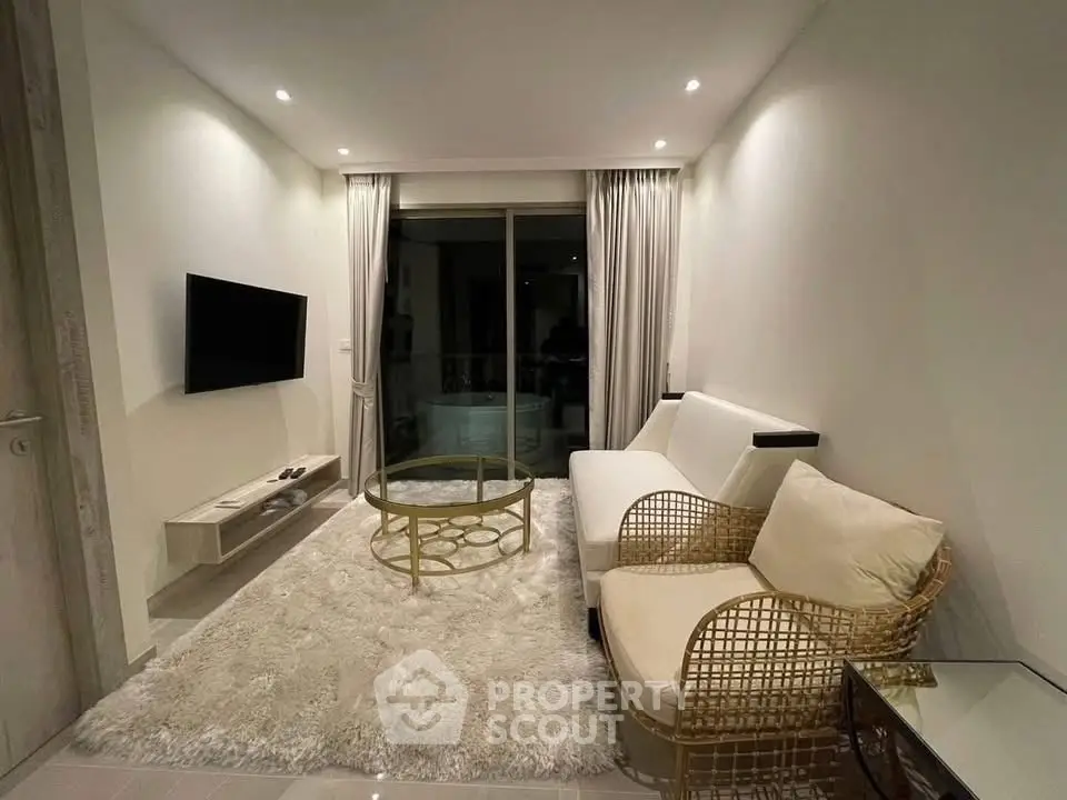 Modern living room with cozy seating and elegant decor