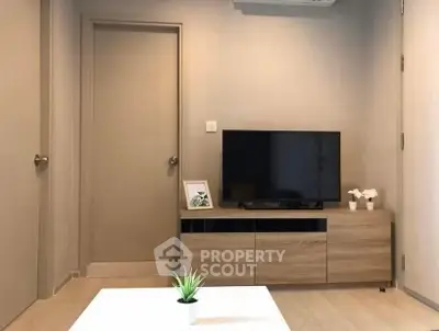 Modern living room with sleek TV stand and minimalist decor
