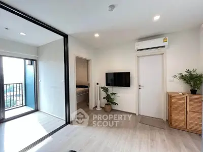 Modern apartment interior with balcony view and sleek design