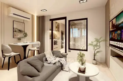 Modern living room with stylish decor and open kitchen layout
