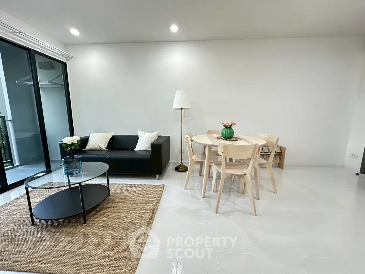 Modern living room with sleek furniture and natural light