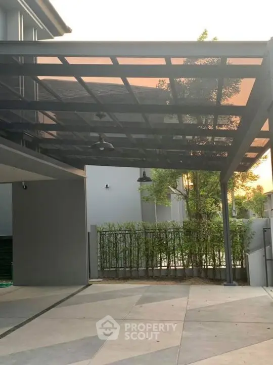 Modern covered parking area with sleek design and natural lighting