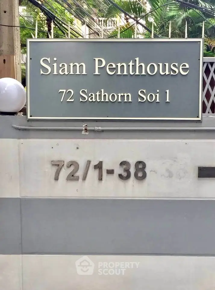 Siam Penthouse entrance sign at 72 Sathorn Soi 1, showcasing prime real estate location.