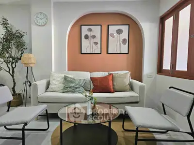 Stylish living room with modern decor and cozy seating area