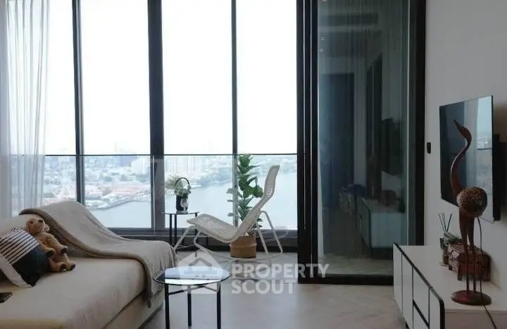 Modern living room with stunning river view and elegant decor