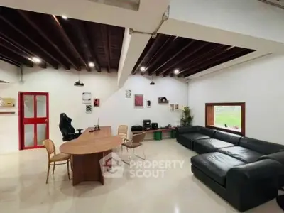 Spacious modern living room with sleek furniture and natural light
