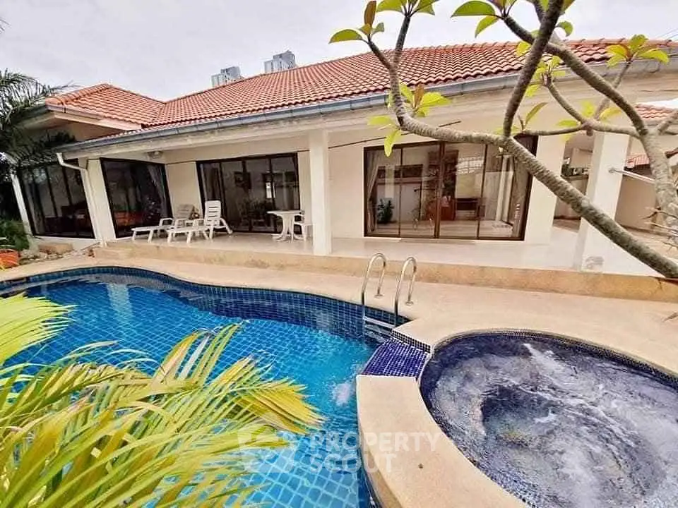 Luxurious villa with private pool and jacuzzi, perfect for relaxation and entertainment.