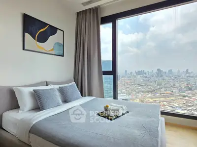 Modern bedroom with stunning city view from large window, featuring elegant decor and cozy bedding.