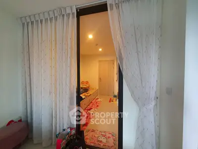 Cozy children's bedroom with playful decor and sliding door curtains