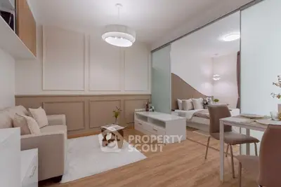 Stylish open-plan living room with cozy seating and elegant decor