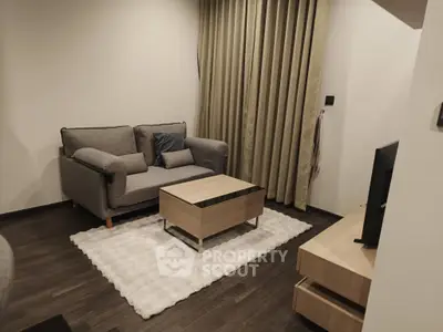 Cozy living room with modern furniture and elegant decor, perfect for relaxation and entertainment.