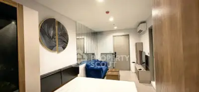Modern studio apartment with stylish decor and cozy living area