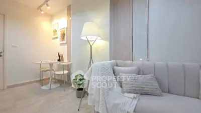 Cozy modern living room with elegant decor and soft lighting