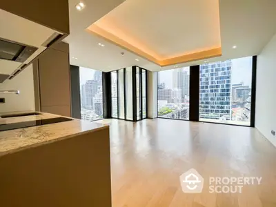 Luxurious open-layout living room with stunning city views and modern finishes.