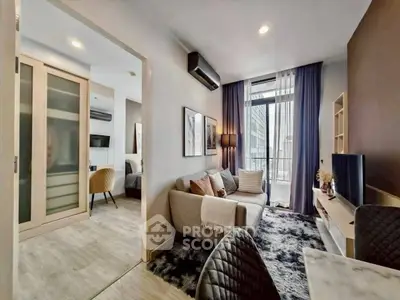 Modern living room with stylish decor and natural light in a contemporary apartment.