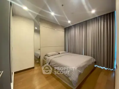 Modern bedroom with cozy lighting and elegant curtains