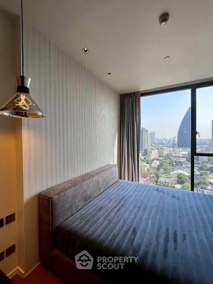 Modern bedroom with panoramic city view and stylish decor