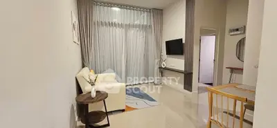 Modern living room with stylish decor and natural light