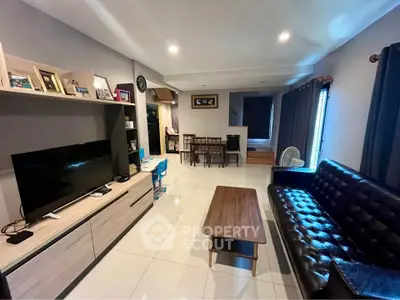Spacious modern living room with sleek furniture and open layout