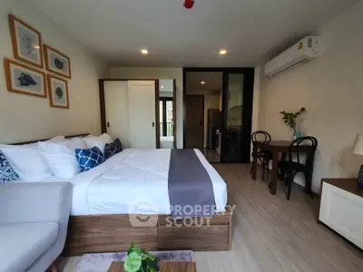 Modern studio apartment with stylish decor and cozy ambiance