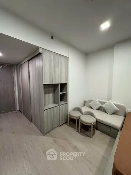 Modern living room with sleek furniture and minimalist design, perfect for urban living.
