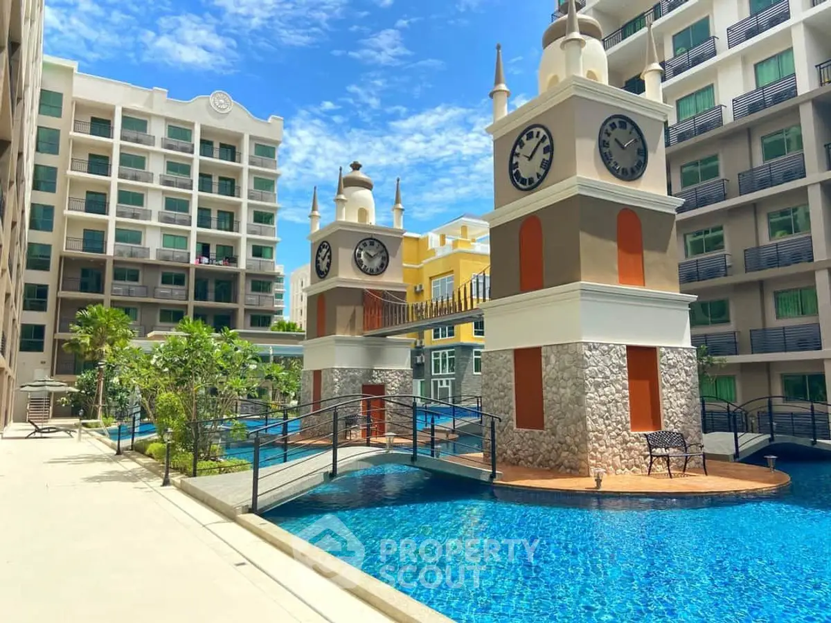 Luxurious condominium with unique clock tower and stunning pool view.