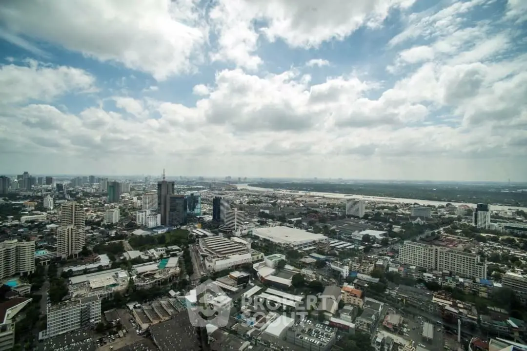 Stunning panoramic cityscape view from a high-rise building, showcasing urban skyline and expansive horizon.