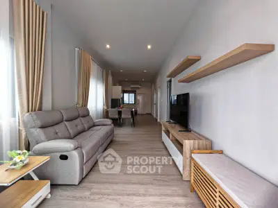 Spacious modern living room with elegant decor and natural light