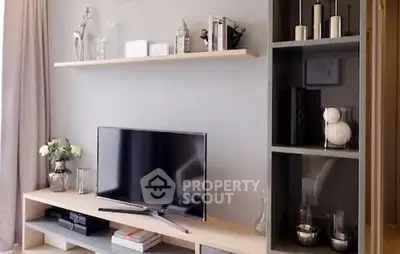 Modern living room with sleek TV stand and decorative shelving