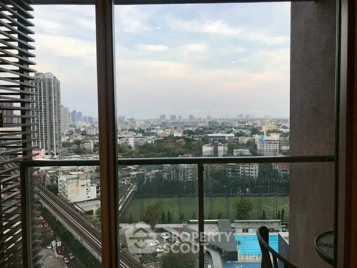 Stunning cityscape view from high-rise apartment window