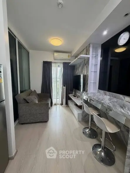 Modern living room with sleek design and natural light