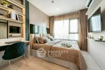 Modern bedroom with stylish decor, large window, and cozy workspace