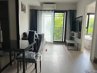 Modern living room with balcony view in stylish apartment