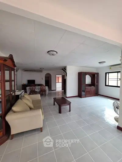 Spacious living room with elegant furniture and natural light