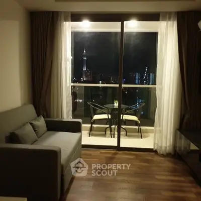 Cozy living room with city view balcony in modern apartment