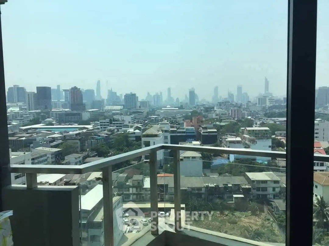 Stunning cityscape view from a high-rise balcony, perfect for urban living enthusiasts.