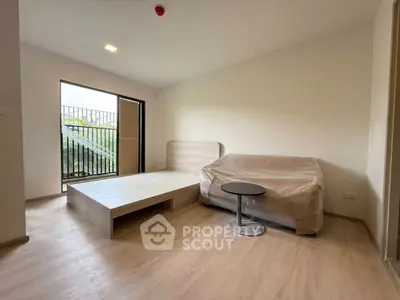 Modern living room with minimalist furniture and natural light