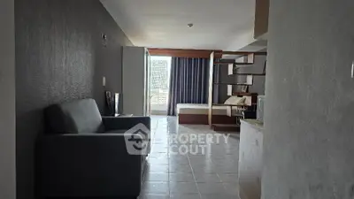 Spacious studio apartment with modern furnishings and natural light