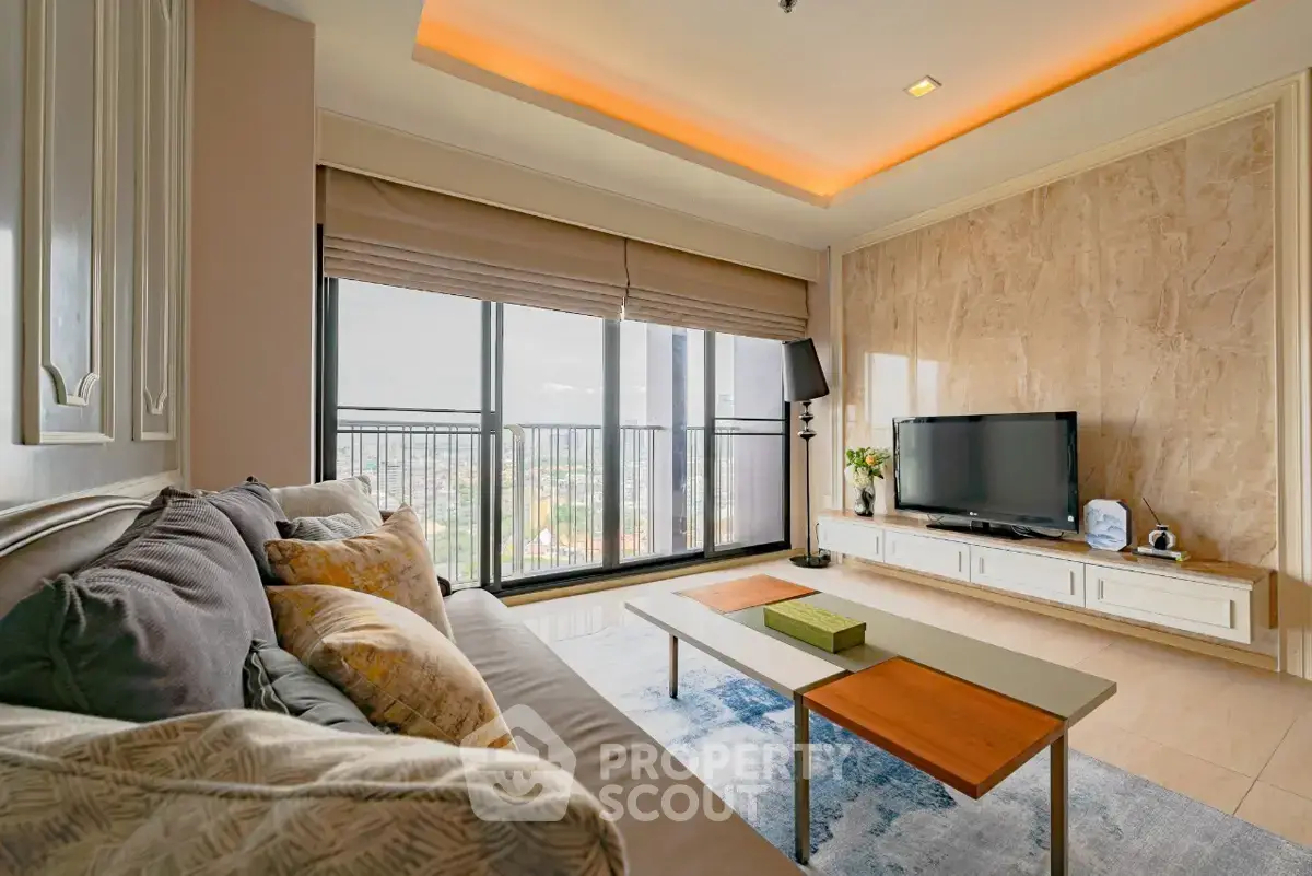 Spacious living room with modern decor and city view balcony in luxury apartment.